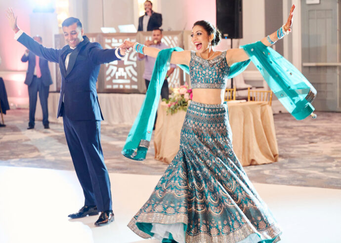 Indian couple dancing in ballroom