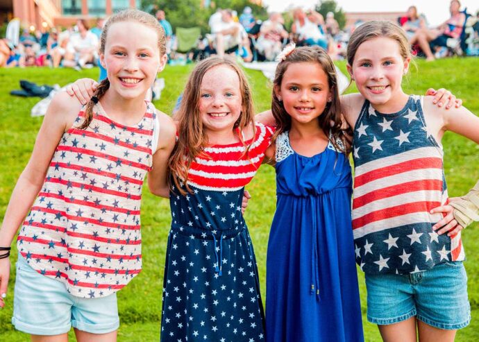 Children posing during 4th of July celebration.