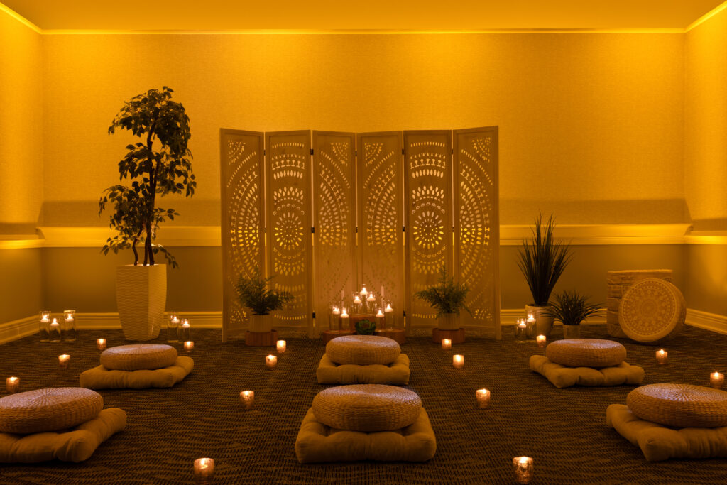 meditation room with pillows and candles