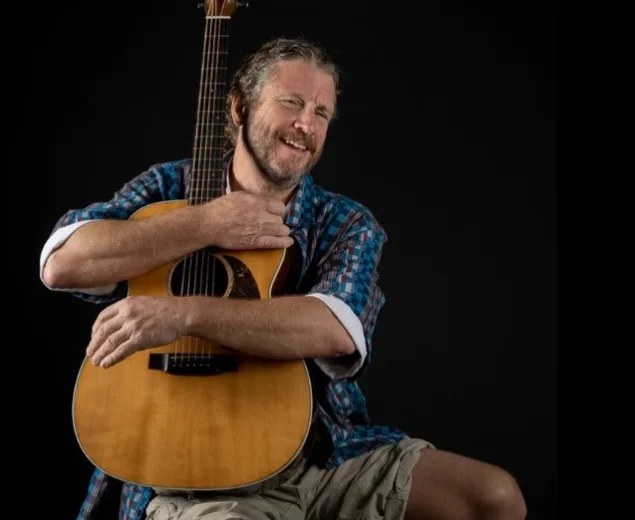 Live musician Dan Barry performing with a guitar at Lansdowne Resort event